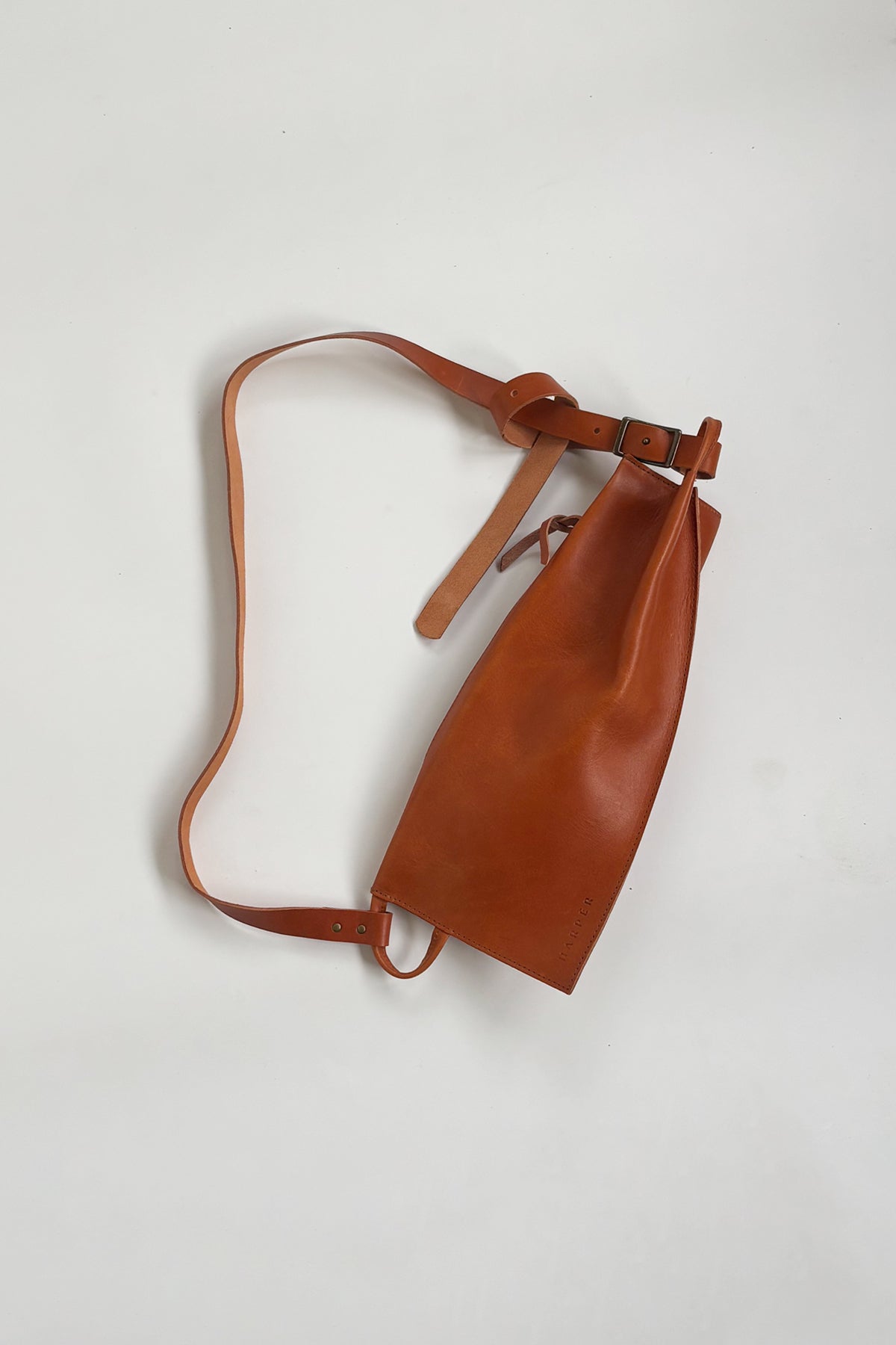 Asymmetrical Leather Sling Backpack in Chestnut Brown Convertible Sling Backpack – AMALAM COLLECTIVE main image 2